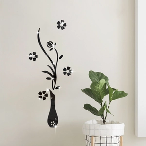 Dettaglio macro dell'adesivo murale specchio 3D in acrilico con vaso e motivi floreali