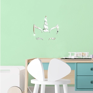 Close-up of unicorn mirror wall stickers in a kids room with acrylic silver finish