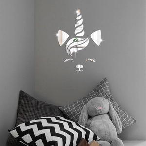 Close-up of a 3D mirror unicorn wall sticker set in a cozy kids bedroom setting