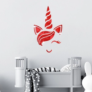 Detail of red acrylic mirror unicorn wall stickers on a clean white wall decoration