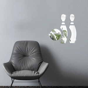 Modern acrylic silver mirror bowling wall decals reflecting plants in a living room decor
