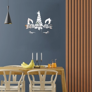 Detailed view of silver unicorn mirror acrylic wall sticker on a modern dark blue wall
