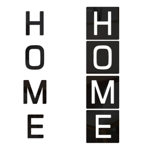 Dettaglio di adesivi murali 3D a specchio lettera HOME in acrilico bianco e nero
