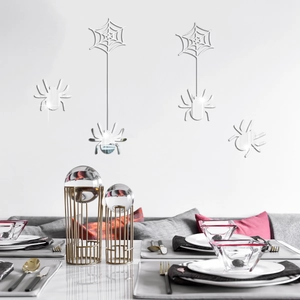 Macro detail of silver acrylic spider mirror wall stickers for Halloween party wall decor