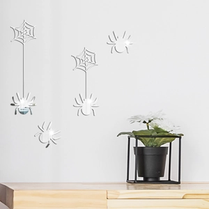 Close-up of spider web mirror wall stickers with reflective surface for Halloween decor