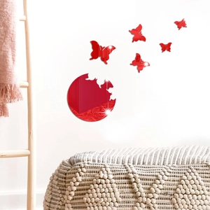 Modern red acrylic butterfly mirror wall stickers displayed on a clean white home interior wall