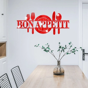 Macro detail of red acrylic Bon Appetit wall sticker with mirror finish and cutlery design