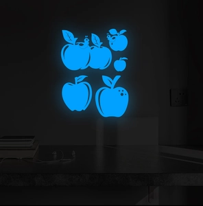 Glow in the dark blue apple wall stickers featuring cute caterpillars in a dark room setting