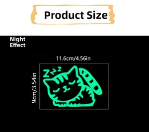 Glow in the dark cat light switch sticker showing night effect and 11.6x9cm dimensions