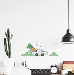 Detail of cute rabbit driving a car wall sticker for nursery or bedroom decor