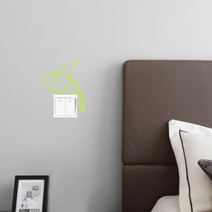 Luminous sleeping cat wall sticker for light switches glows green in the dark