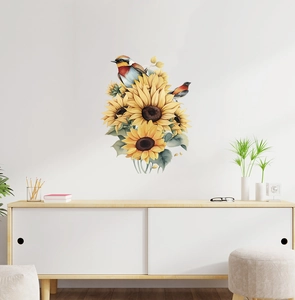 Detail of sunflower and flying birds wall decals on a clean white wall in a cozy room