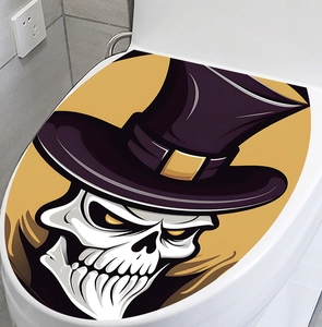 Close-up of waterproof toilet lid sticker with a creative skull in top hat design