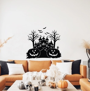 Detailed view of Halloween castle wall decal with bats and pumpkins over a couch