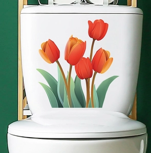 Vibrant orange tulip stickers applied to a white toilet tank for bathroom home decoration