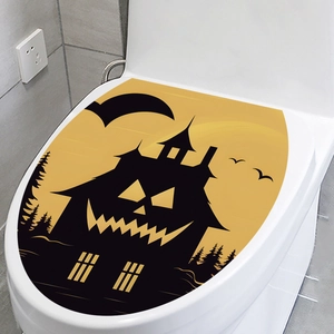 Halloween toilet lid sticker with haunted house and pumpkin on bright yellow background