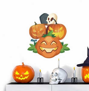 Detail of Halloween pumpkin and skeleton wall stickers displayed on a white bedroom wall
