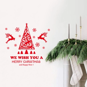 Red Christmas wall decal set featuring abstract tree silhouette and jumping reindeers