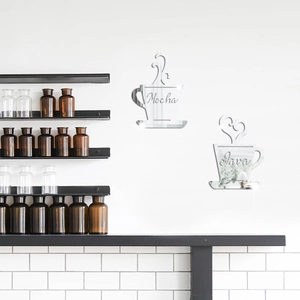 Macro detail of silver acrylic coffee cup wall stickers with Mocha and Java text engraving