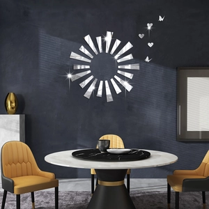 Macro detail of sunburst acrylic mirror wall stickers with heart and butterfly accents