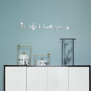Macro shot of silver mirror acrylic wall stickers with 'be safe, i love you' lettering