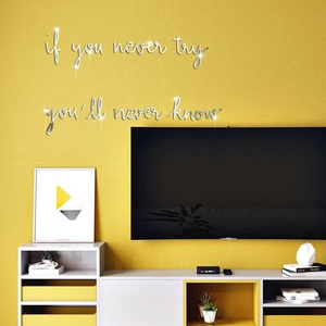 Silver acrylic mirror wall sticker with motivational quote on bright yellow wall decor