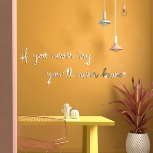Silver mirror acrylic wall sticker with inspirational quote on vibrant yellow wall