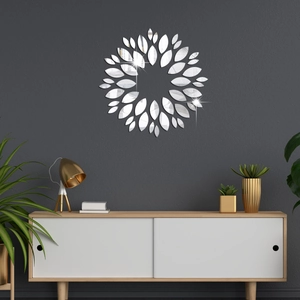 Detail of sunflower mirror wall stickers with reflective teardrop petals on dark grey wall