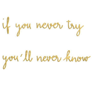 Macro detail of gold wood-textured acrylic wall decal with inspirational quote engraving