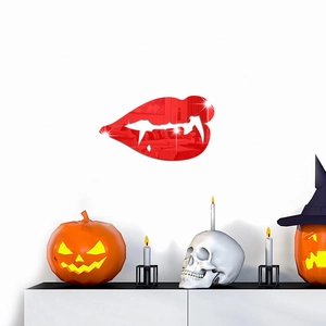 Close-up of red acrylic vampire lip wall mirror with fangs for Halloween room decor