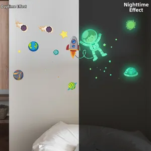 Glow in the dark space stickers showing daytime and nighttime neon effect comparison