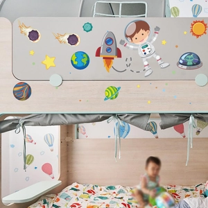 Glow in the dark space astronaut wall stickers featuring planets and rockets for kids rooms