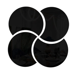 Set of four circular black mirror wall stickers in acrylic for modern home wall decoration