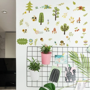 Forest themed luminous wall stickers with trees and mushrooms for kids room decor