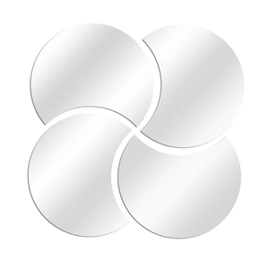 Close-up of four-piece silver semi-circle mirror wall stickers in spiral design