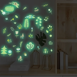 Luminous wall stickers set featuring glowing trees, plants, and butterfly patterns for room decor