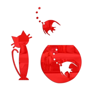 Detail view of red mirror acrylic wall stickers featuring cat and fishbowl shapes