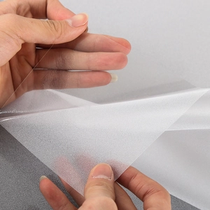 Detail shot of frosted static glass film showing thickness and matte translucent texture