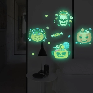 Luminous Halloween wall stickers featuring glowing pumpkins and skulls in a bedroom setting
