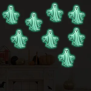 Luminous Halloween ghost wall stickers glowing in dark interior with festive decor