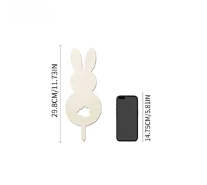 Size comparison of laser-cut wooden rabbit garden stake showing its 29.8cm height