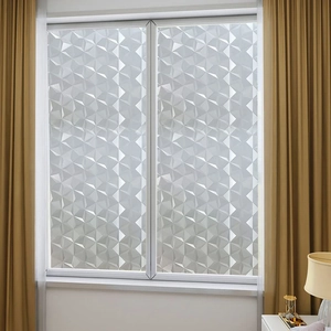Close-up of 3D geometric triangle window privacy film with frosted finish and soft light