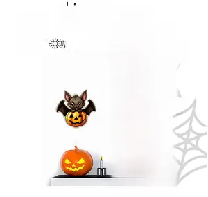 Luminous Halloween wall stickers showing day and night glowing effect with bat and pumpkin