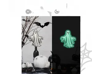 Day and night comparison of glowing ghost wall stickers for Halloween decoration