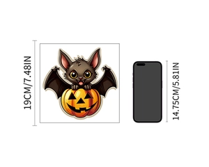 Glow-in-the-dark Halloween bat and pumpkin wall sticker with size comparison to phone