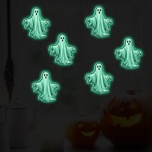 Glow-in-the-dark ghost stickers set for Halloween wall decor with luminous green finish