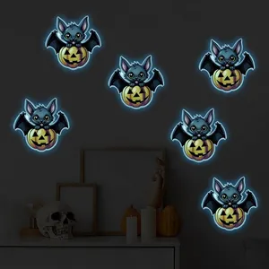 Luminous Halloween wall stickers featuring glowing pumpkins and black bats for home decor
