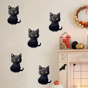 Set di cinque simpatici adesivi luminosi a forma di gatto nero con occhi gialli per Halloween
