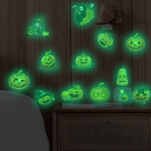 Glow-in-the-dark Halloween wall decals featuring pumpkins and witches for kids' room decor