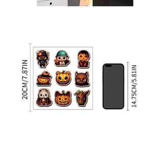 Lot de stickers Halloween fluorescents de 20 cm, comparé à un smartphone noir